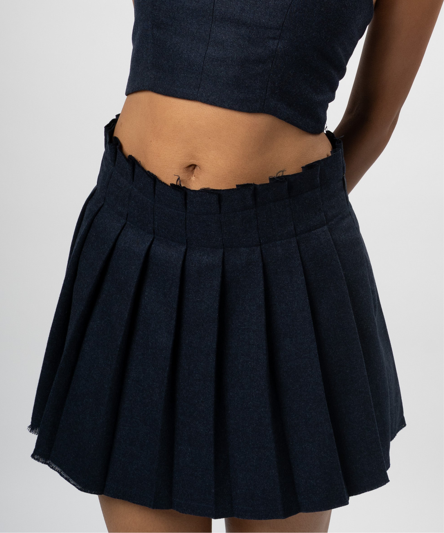 Raw Pleated Woolen Skirt
